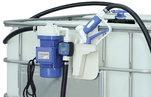 A close-up of a blue electric pump with a digital meter and hoses attached to a large white industrial liquid container.