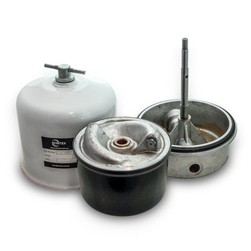 Three metal industrial filter parts are shown: a white canister with a handle, a cylindrical black and silver component, and a round metal part with an attached shaft, all on a white background.