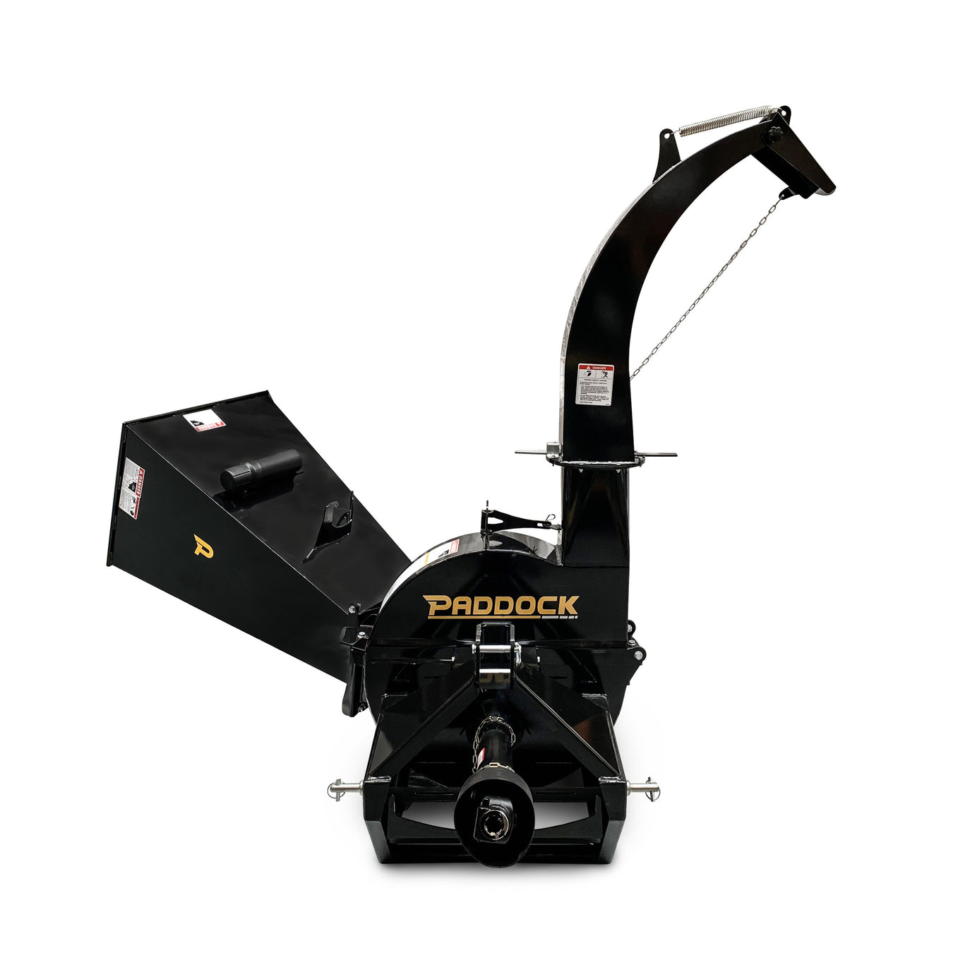 A black Paddock wood chipper with a wide chute, vertical curved discharge chute, and sturdy metal frame, photographed against a white background.