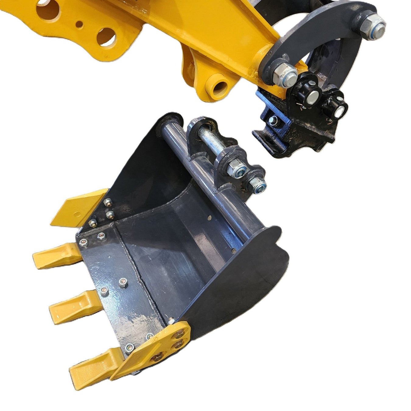 Close-up of a yellow excavator arm with a metal bucket attachment, showing bolts, joints, and bucket teeth, isolated on a white background.