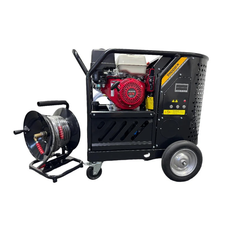 A portable industrial pressure washer with a red engine, black frame, wheels, and a hose reel attachment on the side.