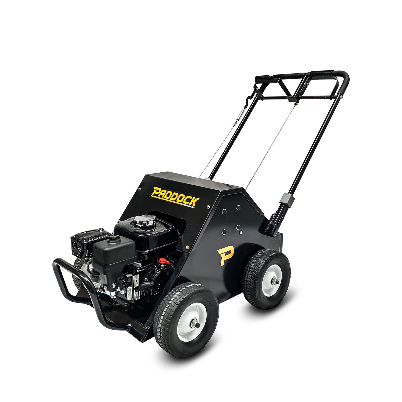 A black Paddock-branded lawn aerator machine with four large wheels, a sturdy metal frame, and a handlebar for pushing. The engine is mounted at the front.
