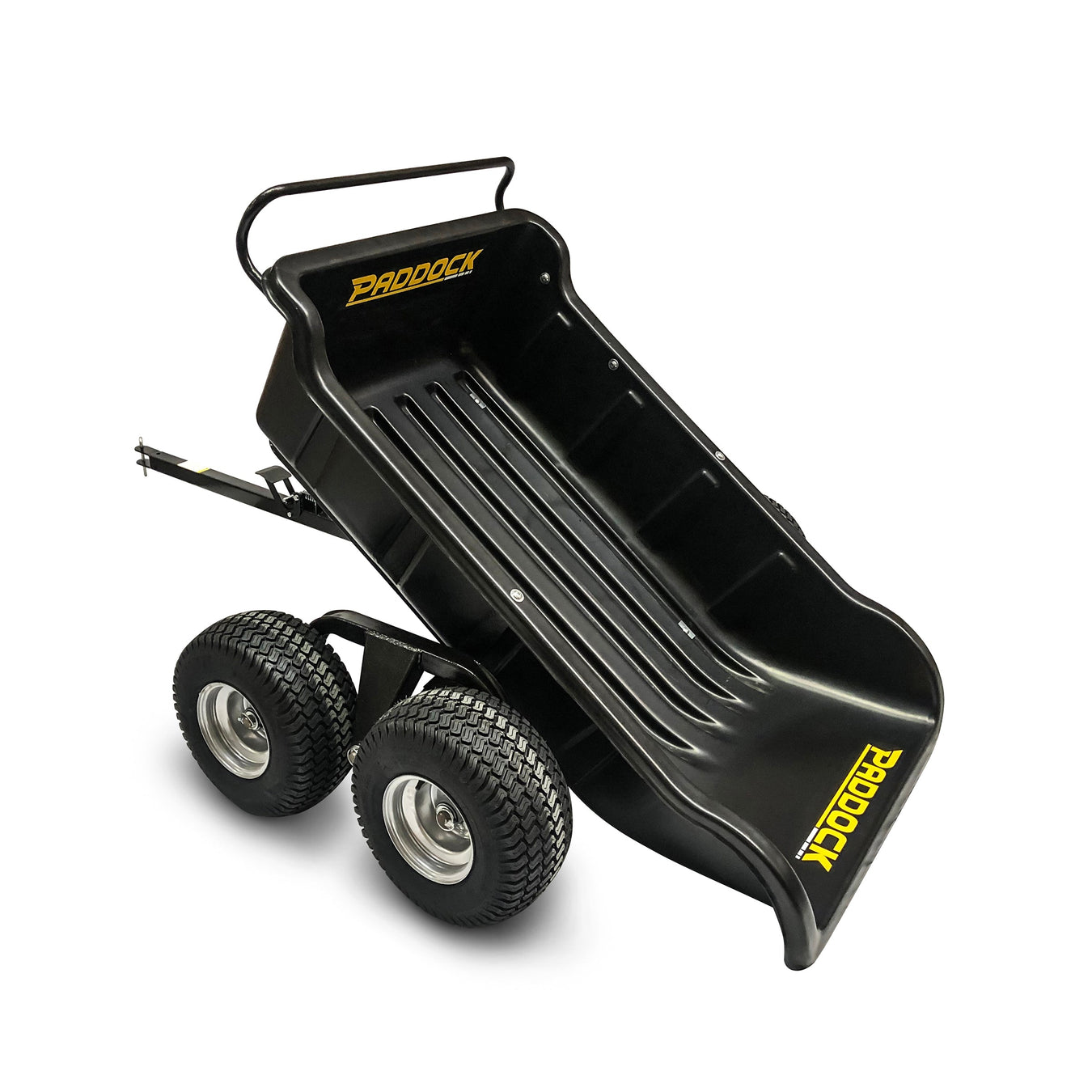 Black Paddock utility trailer with four large wheels and a dump bed, designed for towing behind vehicles such as ATVs or lawn tractors. The trailer features yellow branding and a sturdy metal frame.