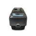 The Scintex Paddock Domestic Water Pump w/VFD 900W is a black, rectangular device featuring a circular dial on the front with buttons and a metallic connector on top, displayed against a white background.