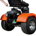A person starts the engine of a Paddock RAT Ride-on Articulating Tipping Barrow, an orange mower with large black tires and an Australian Made sticker, featuring tipping barrow-inspired design.