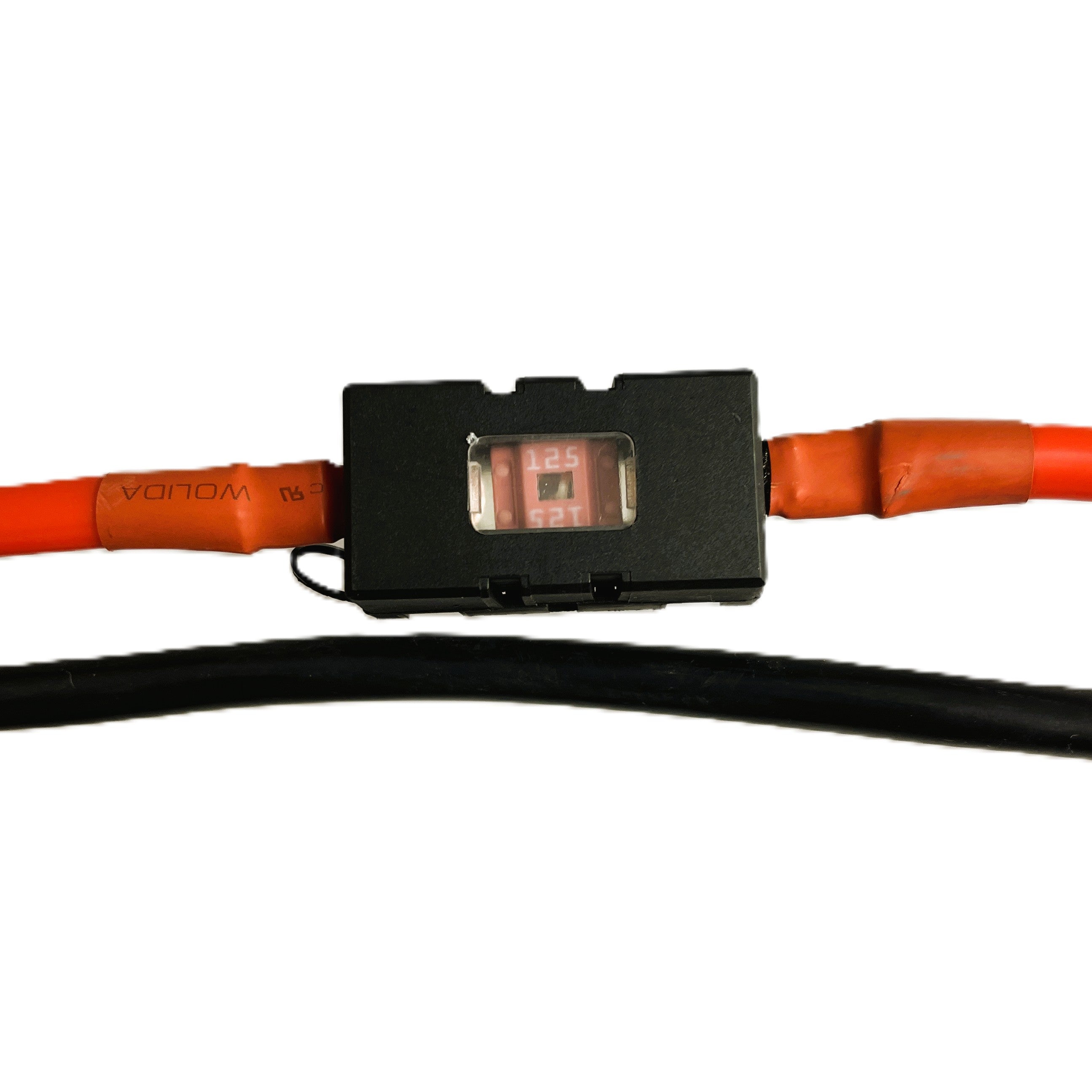 A close-up of a Sherpa 4x4 'BIG V4' Air Compressor (400 L/min) & Digital Tyre Deflator Bundle shows an inline fuse holder with a red 125-amp fuse connecting thick orange cables, ideal for off-road tyre inflation. A black cable runs below on a white background.