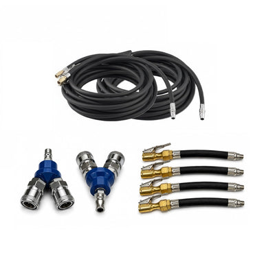 A coiled black air hose, four short hoses featuring brass fittings, and a Y-shaped metal splitter with quick-connect couplings—parts of the Sherpa 4x4 ‘BIG V4’ Quad-Air Upgrade Kit – 4-Tyre Inflation System—are arranged on a white background. Manufactured by Sherpa 4x4, this premium kit is engineered to provide reliable and efficient tyre management for off-road adventures.