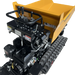 A close-up of the Paddock Tracked Lifting/Tipping Power Barrow by Paddock, featuring control levers, a visible engine, and rubber tracks. This yellow power barrow offers an 800kg capacity and is photographed against a white background.