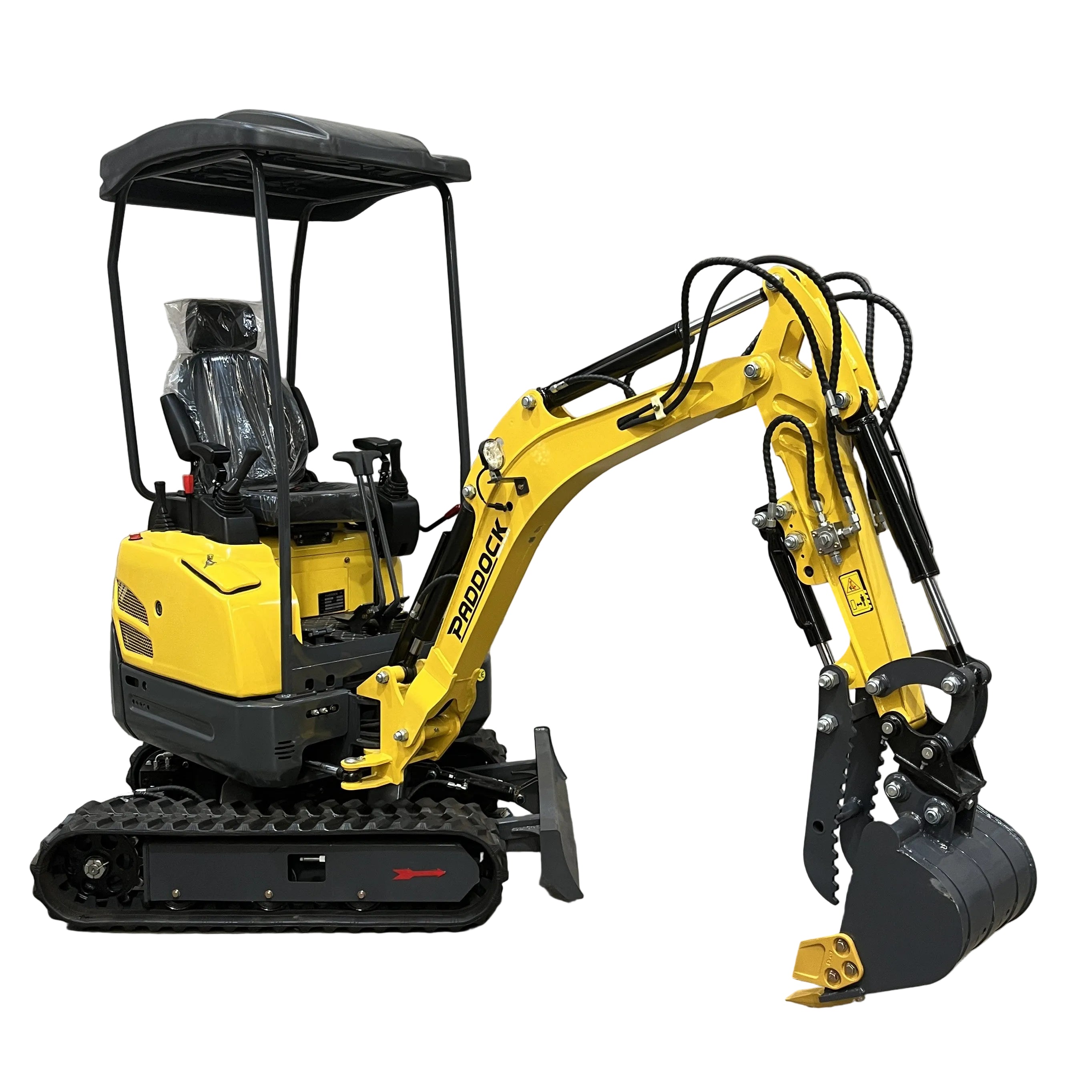 The Paddock Excavator Series 17, featuring a yellow body, black tracks, hydraulic arm, open cab with plastic-covered seat, and “Paddock” label on the arm, is shown isolated on a white background. Includes 6 attachments bundle.