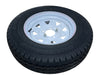 A black rubber tire with a white alloy rim, lying flat on a white background. Designed for Paddock Mini Loader & Excavator Alloy Equipment Trailers, it's ideal for heavy-duty use and features visible tread patterns and embossed markings.