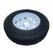 A black rubber tire with a white alloy rim, lying flat on a white background. Designed for Paddock Mini Loader & Excavator Alloy Equipment Trailers, it's ideal for heavy-duty use and features visible tread patterns and embossed markings.