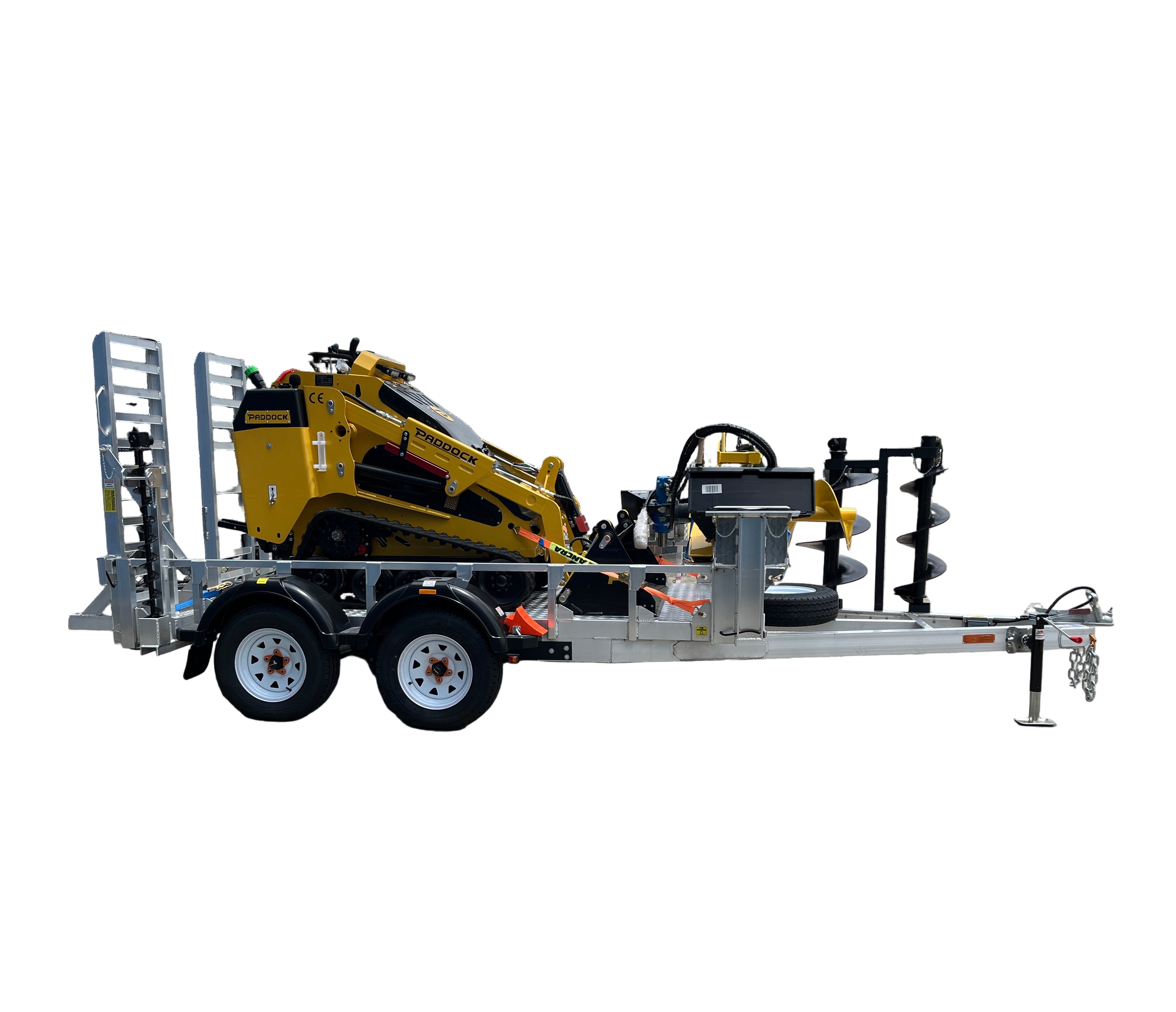 A Paddock Mini Loader is secured on a Paddock Mini Loader & Excavator Alloy Equipment Trailer with ramps, along with an auger and tools. The setup highlights the versatility of Paddock alloy trailers, all isolated on a white background.