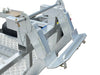 Close-up of a metal power head mount with auger holder, designed for secure equipment transport. The checkered aluminum frame is featured on Paddock’s Mini Loader Trailer Power Head Mount & 3x Auger Holder, built for durability.