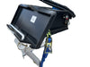 A Paddock Mini Loader Trailer Power Head Mount & 3x Auger Holder—black metal with attached wires, blue/yellow ratchet strap, silver handle, and control knobs—perfect for mini loader trailer setups, shown on a white background.