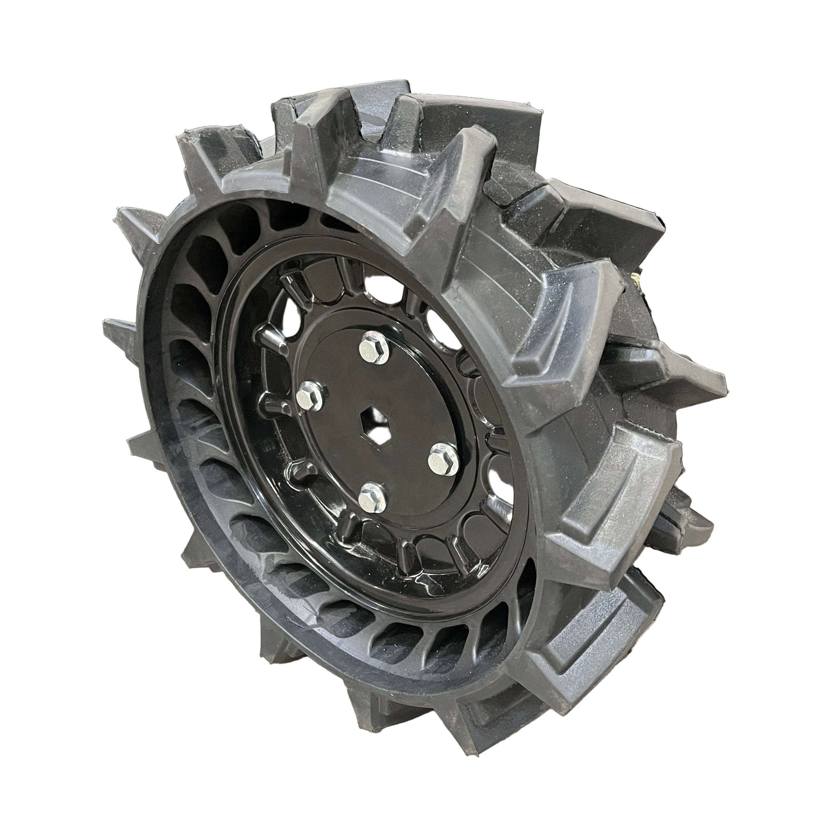 A rugged black wheel with deep, angular treads and a solid central hub with multiple lug nut holes, designed for the Paddock Walk Behind Flail Mower 12HP - 900mm, ideal for vegetation control. Brand: Paddock. Shown on a white background.