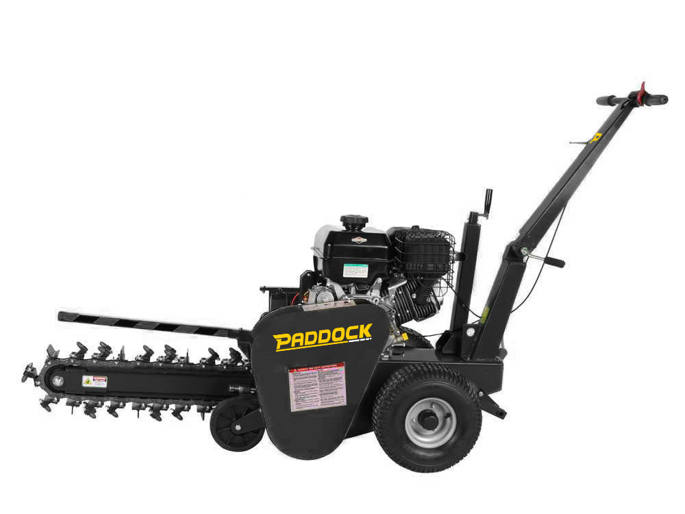 The Paddock Walk Behind Trencher with Guide Wheel by Paddock features large wheels, a long digging arm with rotating cutting teeth, a Briggs & Stratton engine, and handlebars—ideal for digging narrow trenches.