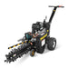 The Paddock Walk Behind Trencher with Guide Wheel by Paddock features black and yellow colors, a Briggs & Stratton engine, large wheels, and a long rotating blade for cutting trenches. Shown on a white background.