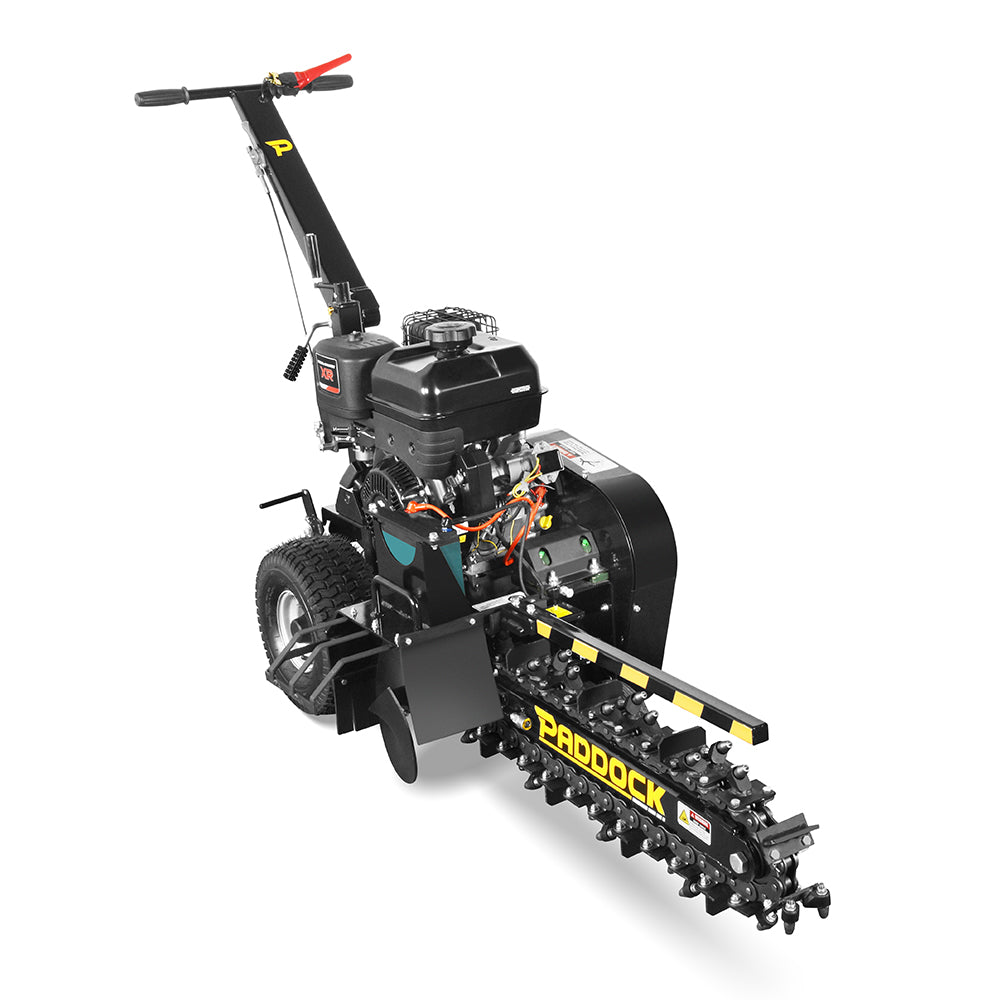 The Paddock Walk Behind Trencher with Guide Wheel features large rear wheels, a Briggs & Stratton engine, and a long digging chain—ideal for creating trenches in soil as a portable solution.