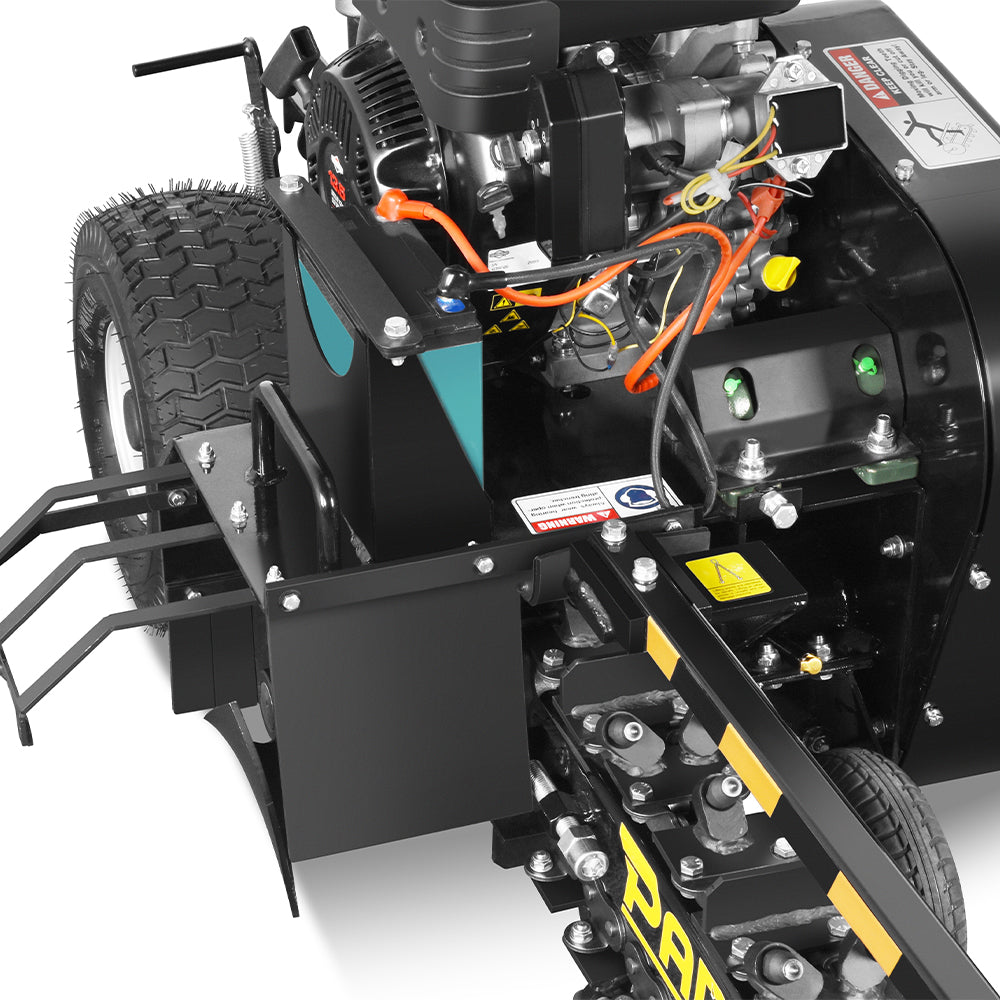 Close-up of the Paddock Walk Behind Trencher with Guide Wheel by Paddock, showing exposed engine components, wires, warning labels, large tires, and part of the toothed rotating mechanism.