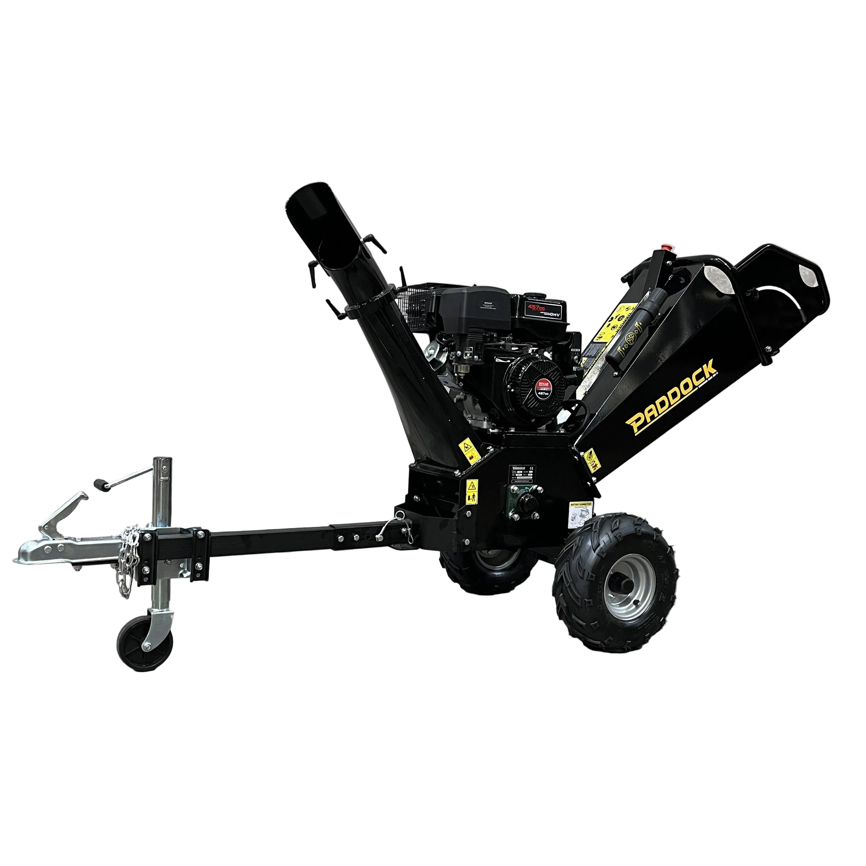 The Paddock Wood Chipper Mulcher by Paddock is a black, portable unit with large wheels and a tow hitch. Positioned on a concrete floor against a gray wall, it features a wood-feeding chute and yellow branding—perfect for garden mulching.