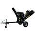 The Paddock Wood Chipper Mulcher by Paddock is a black, portable unit with large wheels and a tow hitch. Positioned on a concrete floor against a gray wall, it features a wood-feeding chute and yellow branding—perfect for garden mulching.