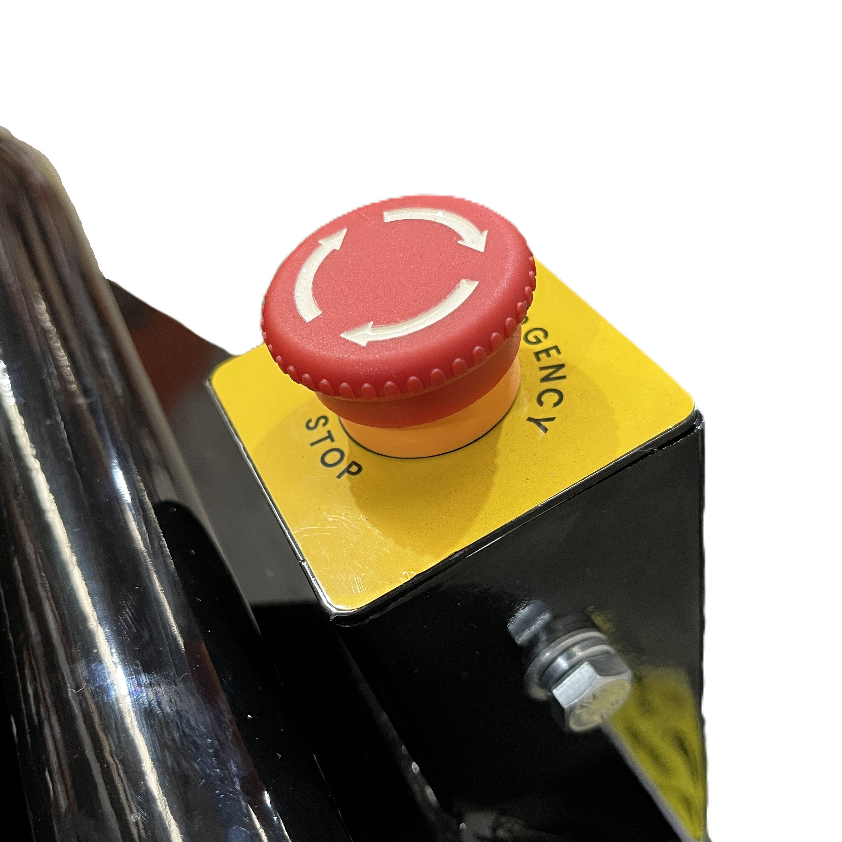 A close-up of a red emergency stop button labeled STOP and EMGENCY on the yellow panel of a Paddock Wood Chipper Mulcher, mounted on its black metal body.