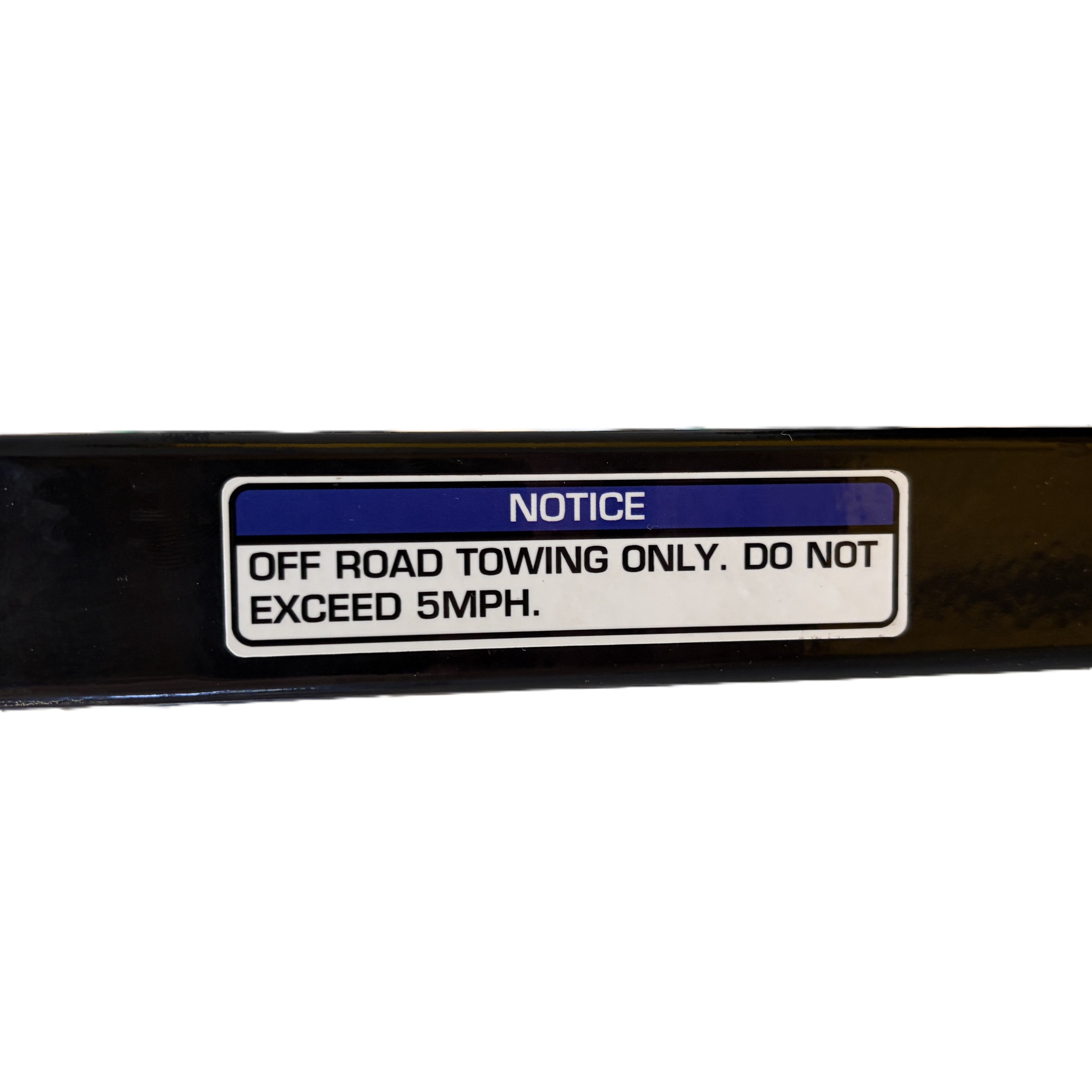 A safety decal on the Paddock™ Wood Chipper Shredder 75mm frame that reads: NOTICE: OFF ROAD TOWING ONLY. DO NOT EXCEED 5MPH.