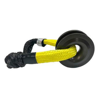 The Sherpa 4x4 Recovery Ring & Soft Shackle Bundle by Sherpa 4x4 features a durable black and yellow synthetic soft shackle paired with a recovery ring, ideal for off-road vehicle recovery and towing.