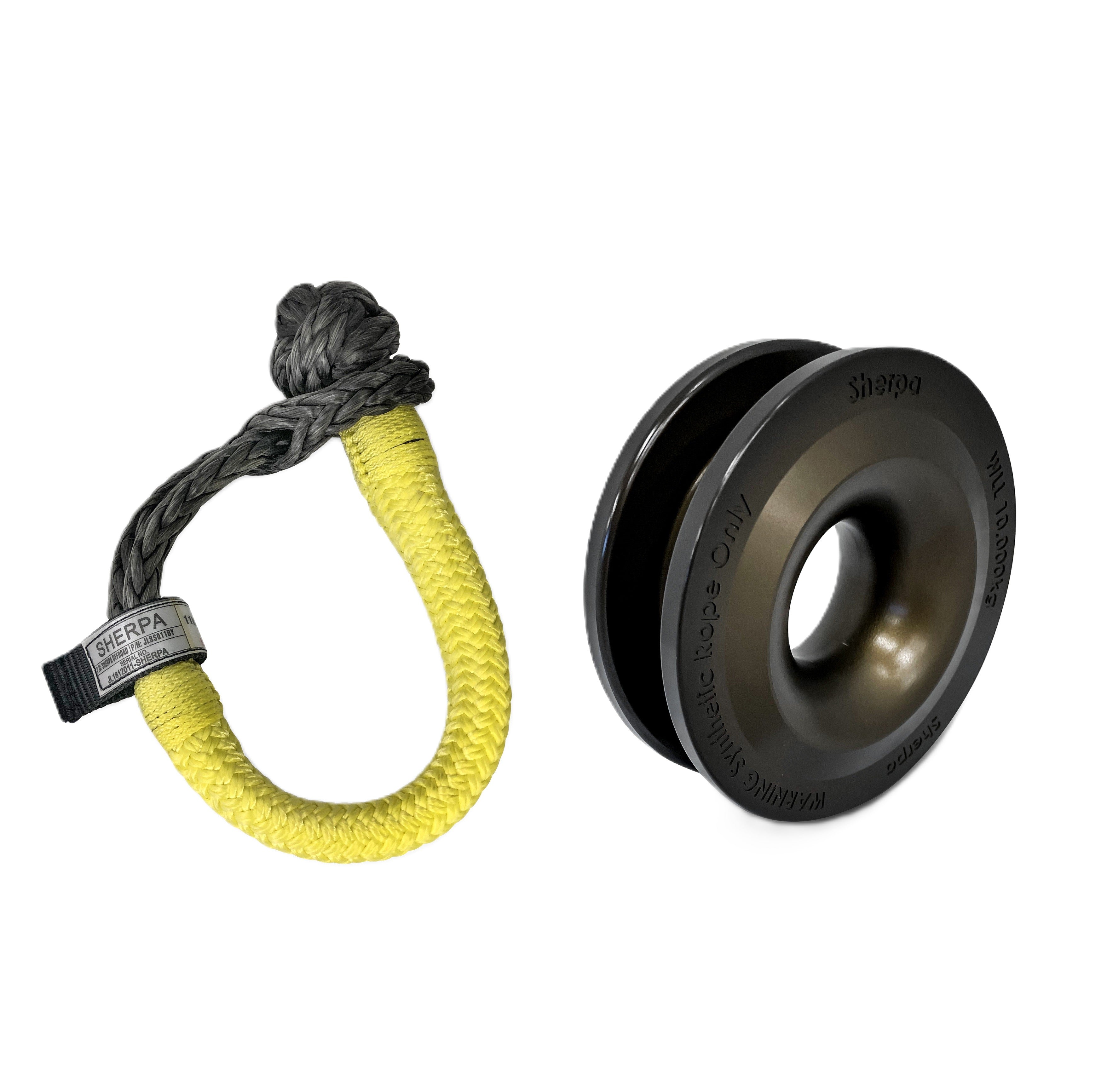 The Sherpa 4x4 Recovery Ring & Soft Shackle Bundle by Sherpa 4x4 features a heavy-duty soft shackle with a yellow sleeve and a black metal recovery ring, both designed for vehicle off-road recovery.