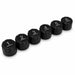 Six black round caps, each labeled in white with numbers 1 to 6, are arranged in a row on a plain white background. These evenly spaced caps are part of the Sherpa 4x4 Tyre Pressure Monitoring System (TPMS) by Sherpa 4x4.