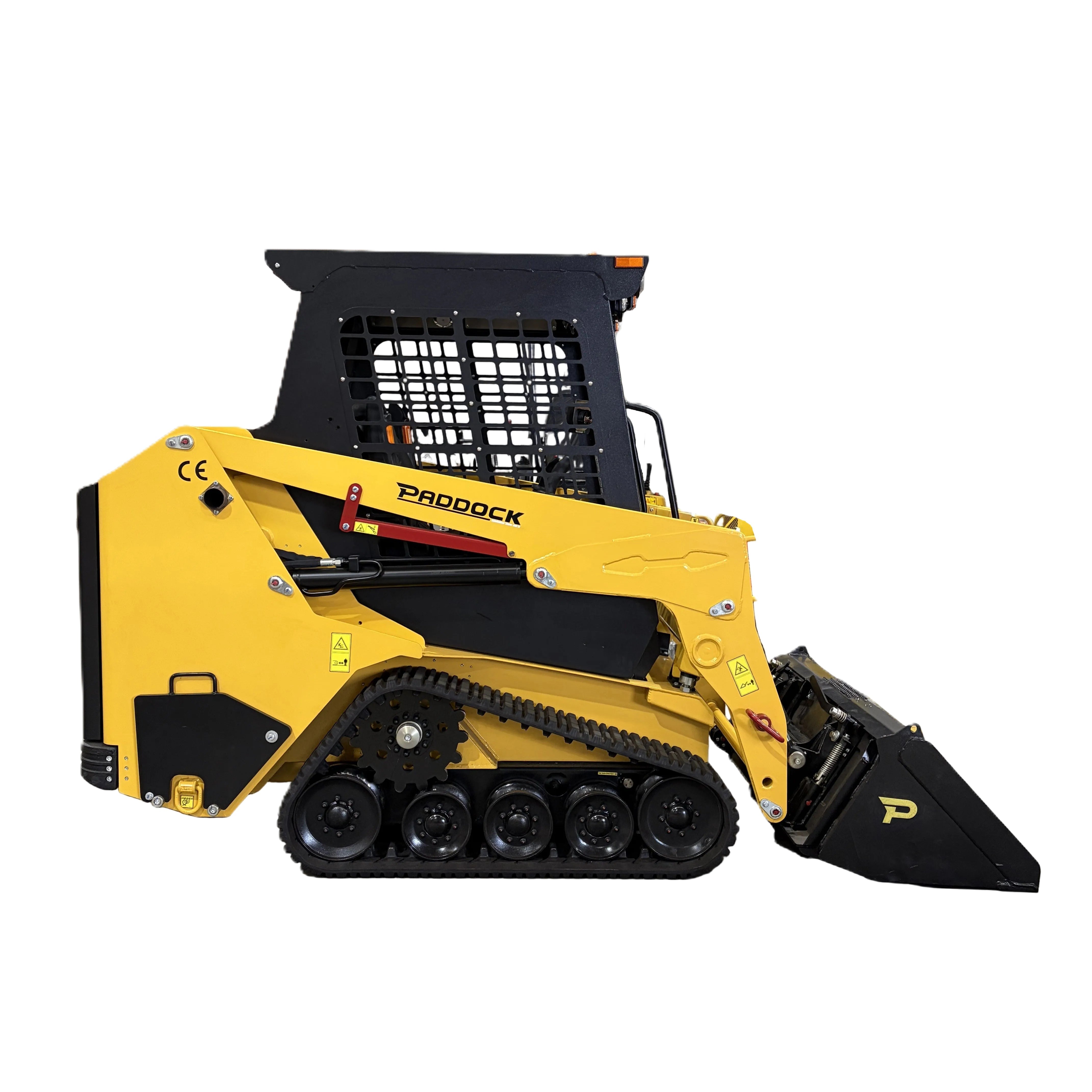 A side-view of the Paddock Tracked Cabin Loader Pro—yellow and black, with a protective cab, front bucket attachment, and visible tracks—features a 40hp Perkins Turbo Diesel Engine. Ex Demo; built for demanding construction needs.