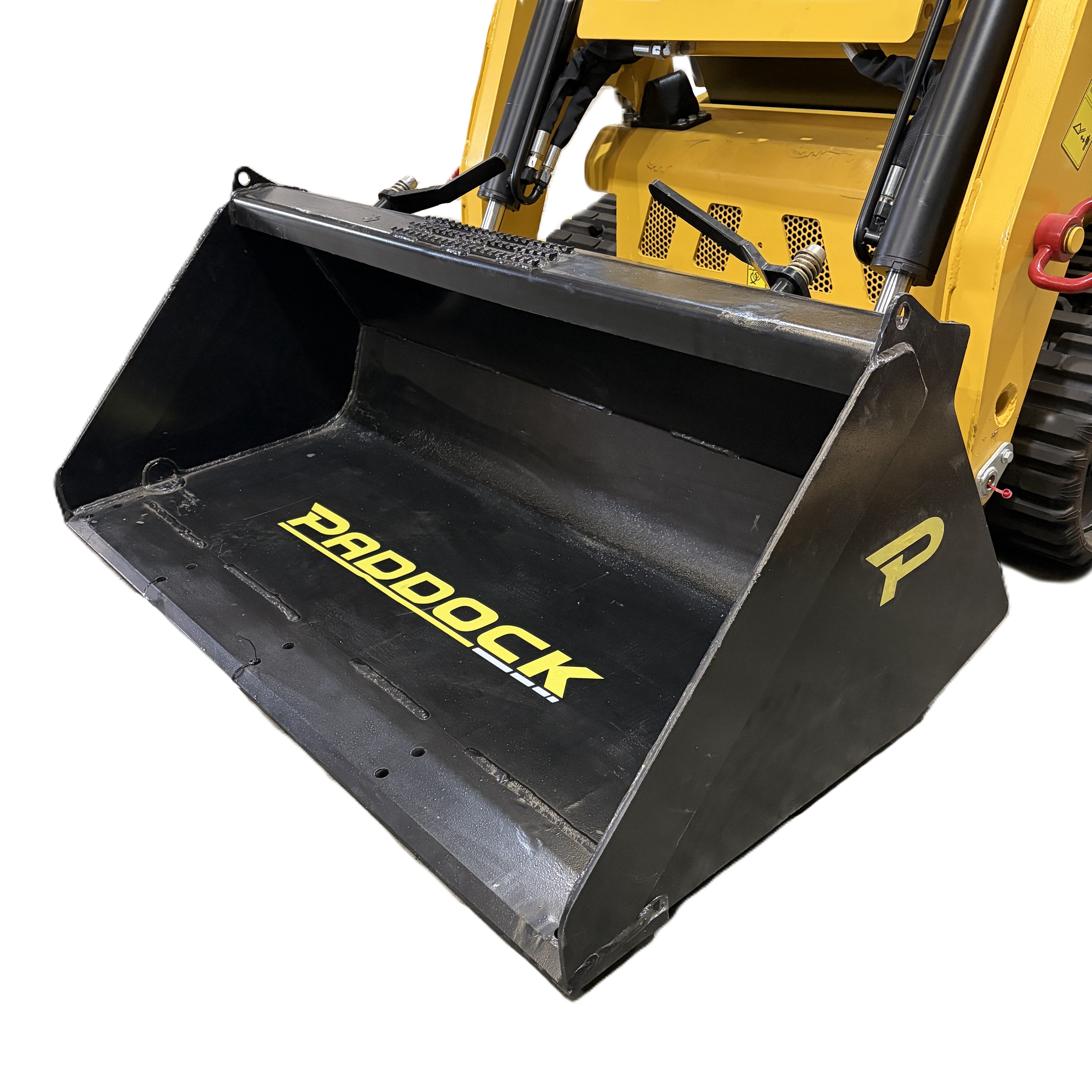 A close-up of a Paddock Tracked Cabin Loader Pro with yellow cabin, black tracks, and front bucket. Features include a 40hp Perkins Turbo Diesel engine. "PADDOCK" branding in yellow is visible. Shown as an ex demo construction equipment model.
