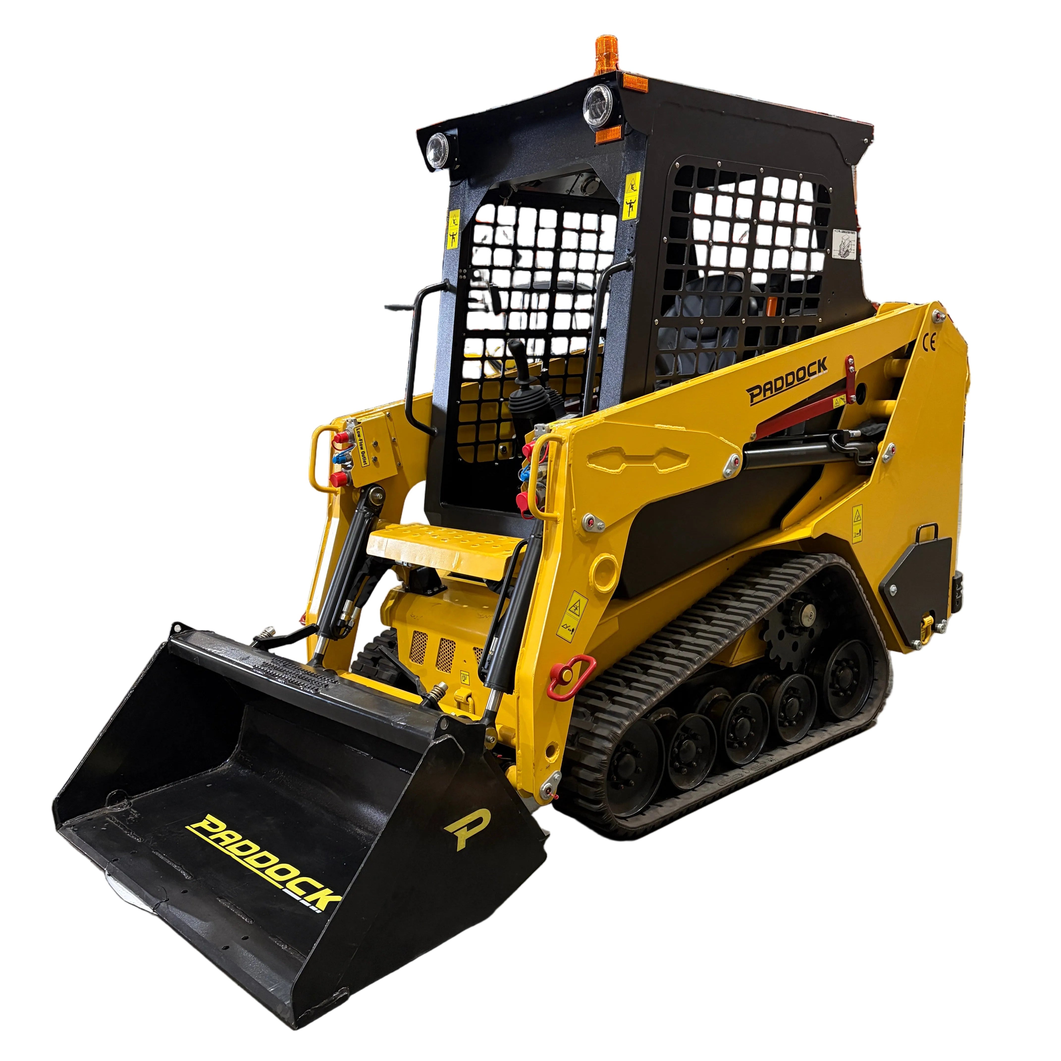 The Paddock Tracked Cabin Loader Pro, featuring a yellow and black design, front bucket, safety cage, visible Paddock branding, and a 40hp Perkins turbo diesel engine, is shown on a white background. Ex Demo model.