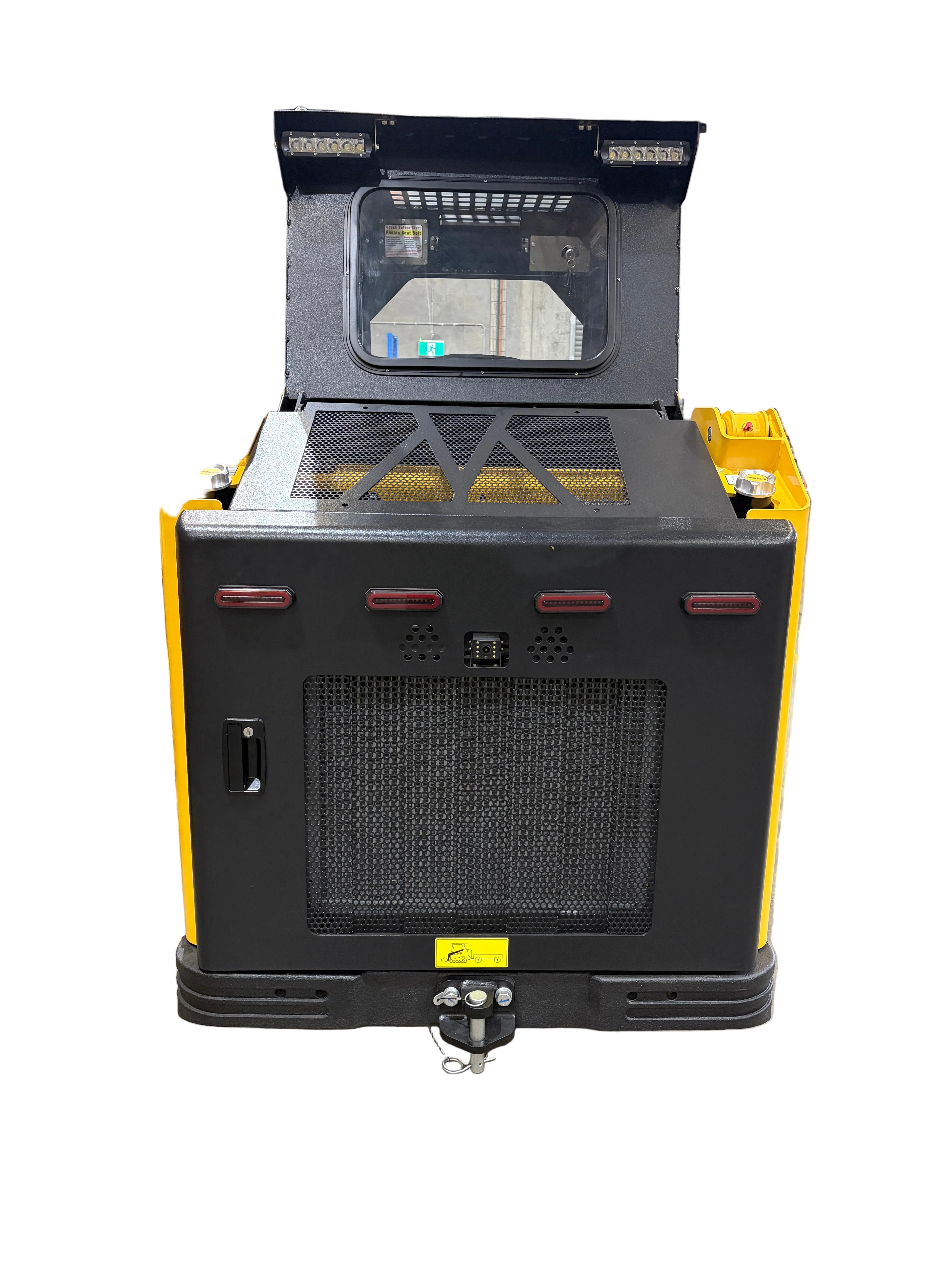 Rear view of the Paddock Tracked Cabin Loader Pro with a 40hp Perkins turbo diesel engine—features yellow tracks, black vented engine cover, red lights, tow hitch, and open rear window. Ex Demo from Paddock—ideal for tough construction jobs.