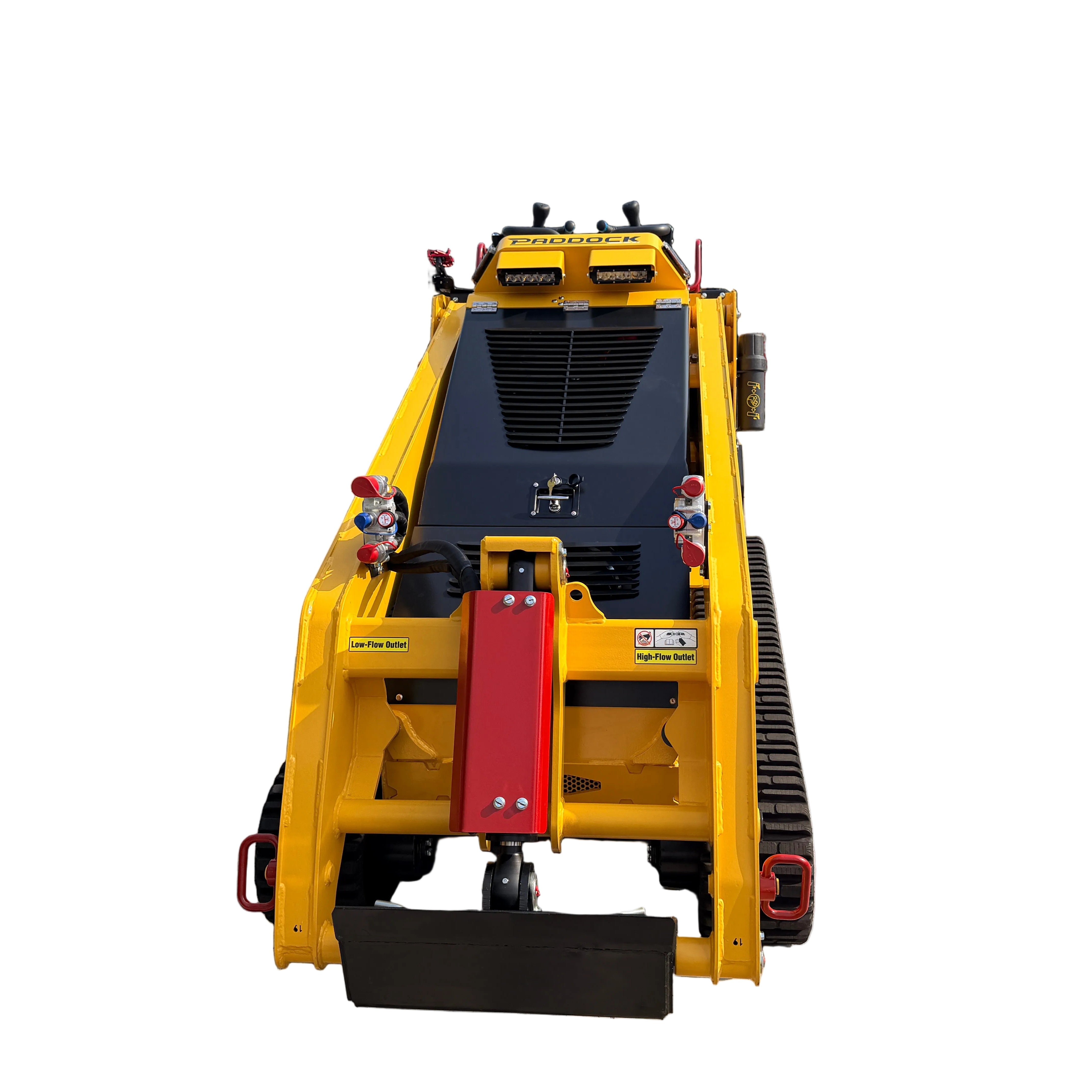 The Paddock™ Tracked Mini Loader Pro featuring a 58hp Yanmar 4-cylinder turbo diesel engine is shown from the front, highlighting its distinct yellow body, durable black tracks, red handle, and easy-access control levers. This versatile compact construction equipment by Paddock boasts a sleek design that stands out crisply against the white background, clearly showcasing every detail.