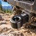 Black Sherpa 4x4 Alloy Soft Shackle Recovery Hitch mounted to the rear of an off-road vehicle as a 4x4 recovery point.