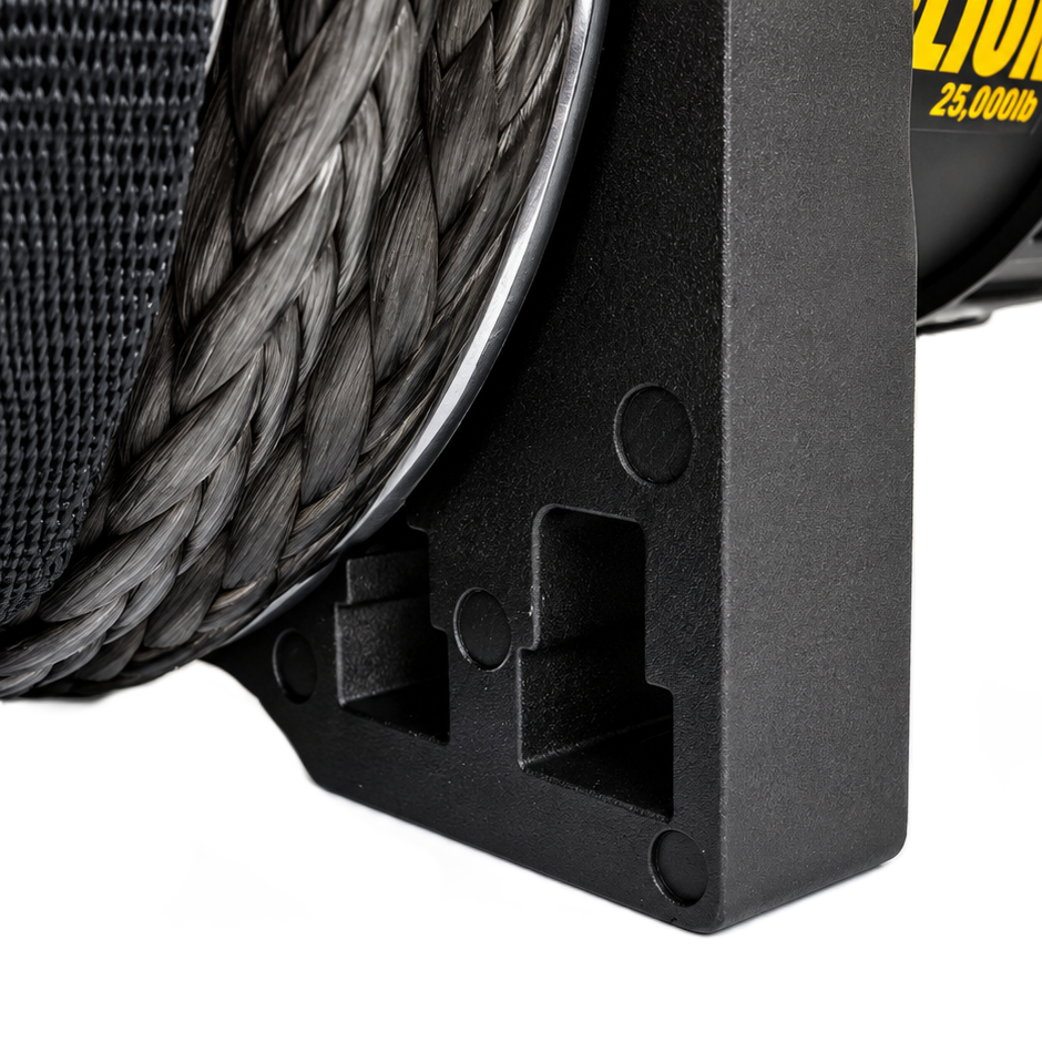 Close-up of a Sherpa 4x4 Black Edition ‘Stallion’ 25,000Lb Winch with black synthetic rope wound tightly around the spool, featuring a robust metal bracket in the foreground and part of yellow branding visible in the background—ideal for heavy recovery operations or use as an electric truck winch.