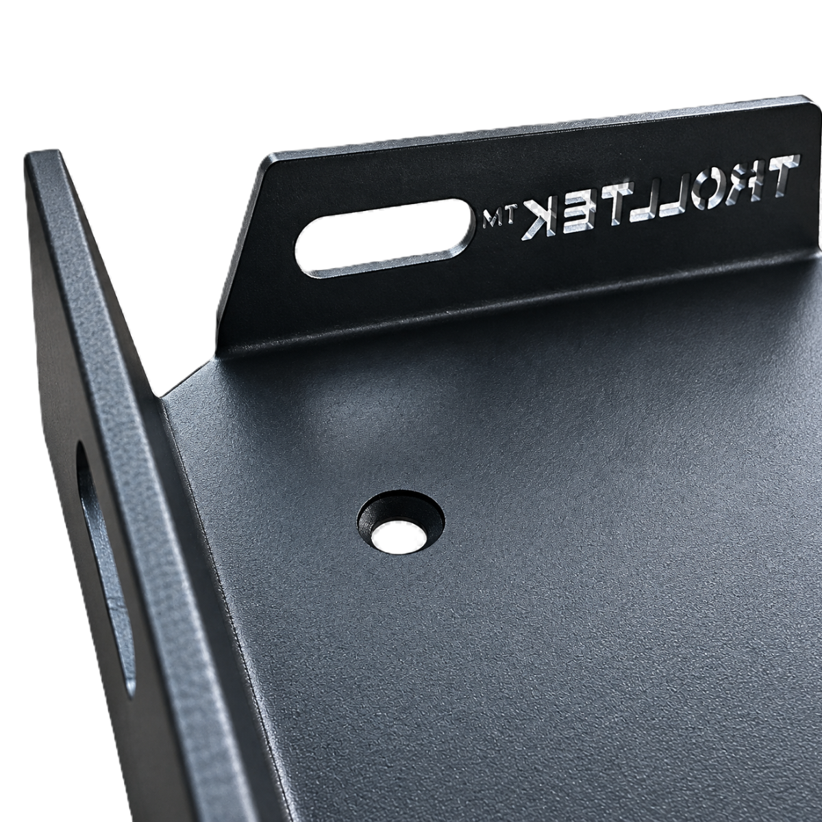 Close-up of a heavy-duty black metal Trolltek™ Aluminium Battery Tray Kit with a laser-cut logo on the side flange and a mounting hole in the base.