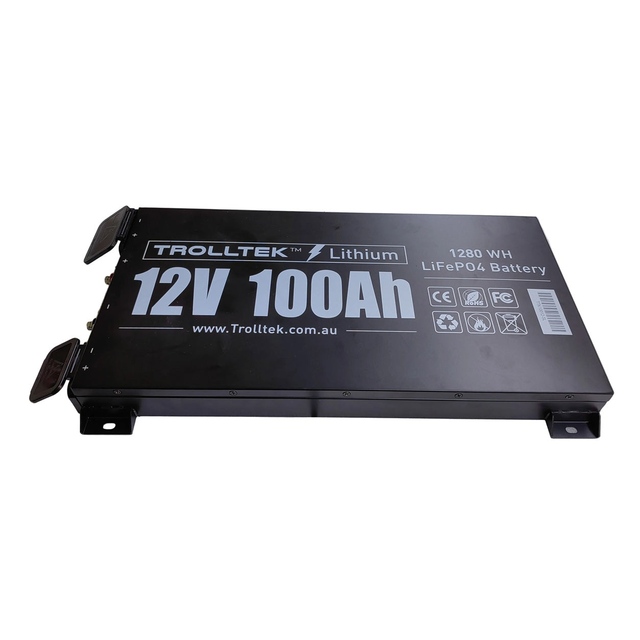 A black rectangular Trolltek™ 12V LiFePO4 Super Slimline Lithium Battery with Bluetooth app, rated at 12V 100Ah and 1280 Wh, featuring advanced lithium iron phosphate technology. The battery has website details printed in white on the top, and comes with two terminal connectors plus sturdy mounting brackets for secure marine installation.