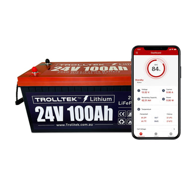 A Trolltek™ 24V LiFePO4 Lithium Battery with Bluetooth is pictured beside a smartphone showing an app dashboard and 84% state of charge.
