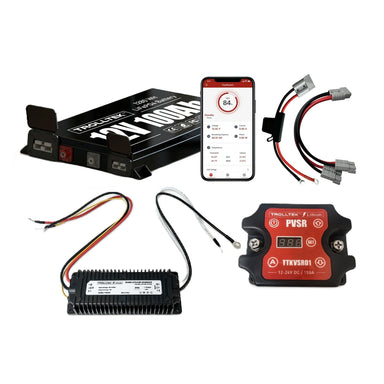 The Trolltek™ 12V LiFePO4 Lithium Slimline Battery DC Bundle – Charge While Driving (DC) by Trolltek includes a 12V LiFePO4 lithium battery, wiring, red control modules, a DC/DC lithium battery charger, and features smartphone app compatibility for real-time battery monitoring.
