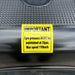 A yellow "IMPORTANT" label states: Maintain tyre pressure at 55psi, max speed 110km/h, on a black textured surface—perfect for Paddock Mini Loader & Excavator Alloy Equipment Trailers by Paddock.