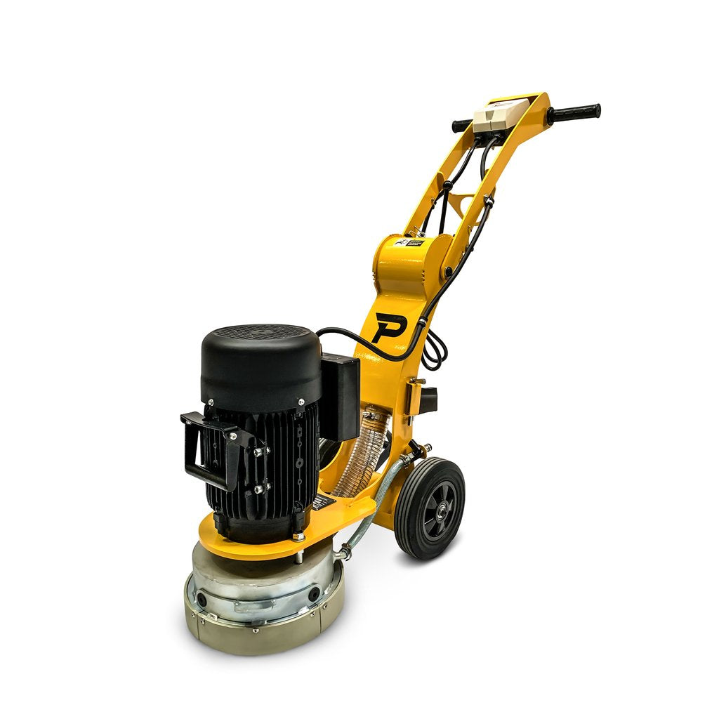 The Paddock™ Concrete Floor Grinder from Paddock features a yellow industrial design with a black motor and handle, mounted on two wheels for easy mobility. Designed for efficient polishing and grinding of concrete surfaces, this grinder can be used in combination with the included vacuum and dust separator to provide effective dust control during operation.