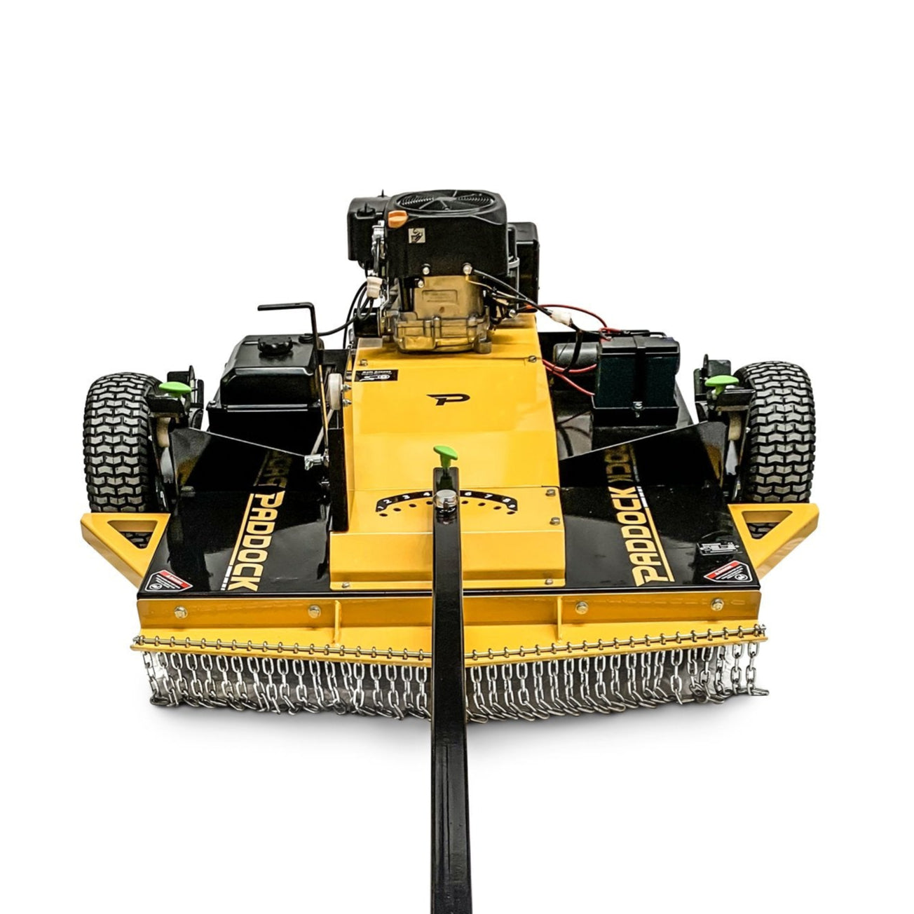 The Paddock Rough Cut Mower Slasher by Paddock is a yellow heavy-duty tow-behind mower with large tires, a black and yellow tow arm, and a visible engine, shown on a white background.