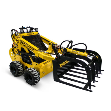 The Paddock Grapple Attachment by Scintex is designed for use with yellow Paddock Machinery mini skid steer loaders. Featuring large tires and hydraulic operation, it’s ideal for lifting and handling materials reliably.