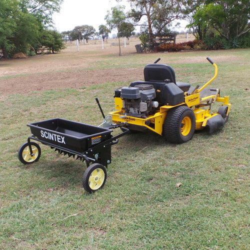 tow behind fertilizer seed spreader for mower